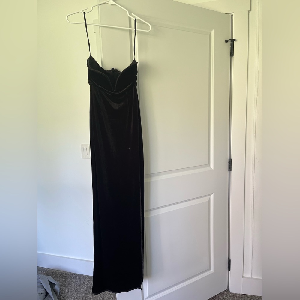 Black gown, strapless with a high slit